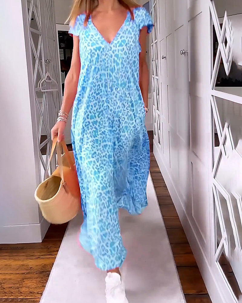 Noémie™ – Farbenfrohes Sommerkleid mit elegantem V-Ausschnitt und schicken kurzen Ärmeln
