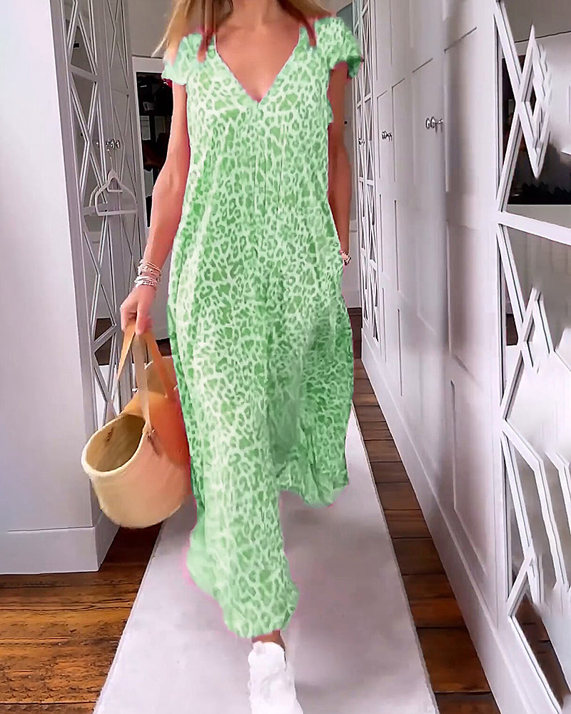 Noémie™ – Farbenfrohes Sommerkleid mit elegantem V-Ausschnitt und schicken kurzen Ärmeln