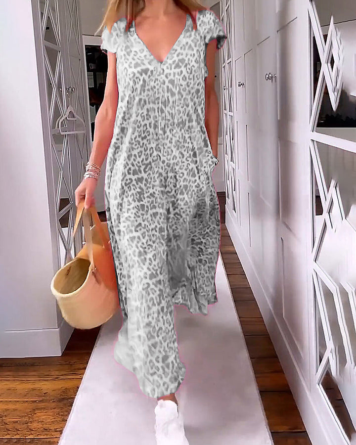 Noémie™ – Farbenfrohes Sommerkleid mit elegantem V-Ausschnitt und schicken kurzen Ärmeln